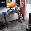 RaDEWAY Gaming Desk, Z-Shaped Computer Desk Gamer Workstation with Monitor Stand & Carbon Fiber Surface, Gamer Table with RGB Lights， Cup Holder, Headphone Hook & Plug Board Holder